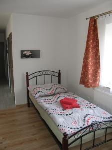Ein Bett oder Betten in einem Zimmer der Unterkunft Apartmán Marie