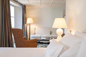 Postel nebo postele na pokoji v ubytování Hotel Cappuccino - Palma