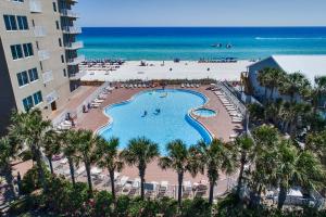 an aerial view of a swimming pool and the beach at Tidewater Beach Resort by Panhandle Getaways in Panama City Beach