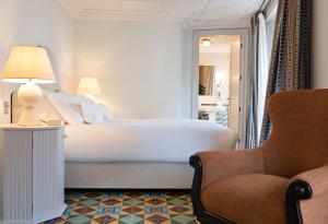 Postel nebo postele na pokoji v ubytování Hotel Cappuccino - Palma