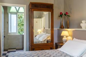 A bed or beds in a room at Relais La Placa