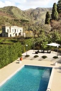 The swimming pool at or close to Relais La Placa