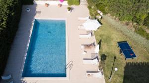 The swimming pool at or close to Relais La Placa