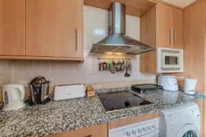 Kuchyň nebo kuchyňský kout v ubytování Apartamento con encanto en Granada, La Zubia