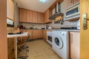 Kuchyň nebo kuchyňský kout v ubytování Apartamento con encanto en Granada, La Zubia