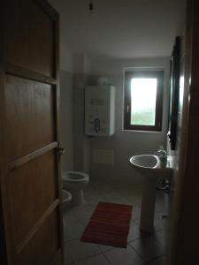 Vonios kambarys apgyvendinimo įstaigoje Masseria dei Monelli