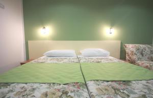 Postel nebo postele na pokoji v ubytování Hotel Sali + 20 fotografií