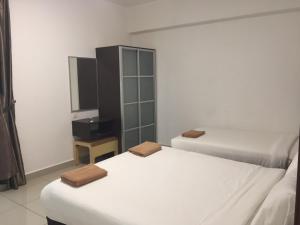 Postel nebo postele na pokoji v ubytování Marina Heights Resort