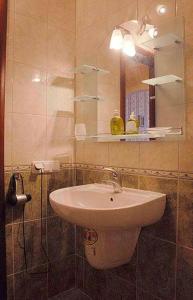 Kylpyhuone majoituspaikassa Diplomat ApartHotel