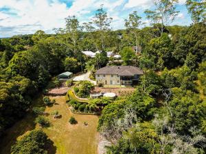 an aerial view of a house in the forest at Casa Al Lago in Montville