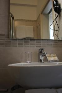 Koupelna v ubytování Hotel Margherita Meublè