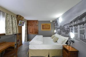 Postel nebo postele na pokoji v ubytování Mollino Rooms