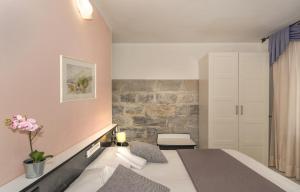 Postel nebo postele na pokoji v ubytování Hotel Amalfitana