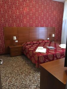 Postel nebo postele na pokoji v ubytování Casa Dolce