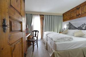 Postel nebo postele na pokoji v ubytování Mollino Rooms