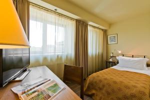 Cama ou camas em um quarto em Best Western Vilnius