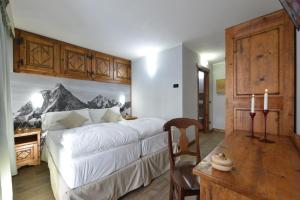 Postel nebo postele na pokoji v ubytování Mollino Rooms