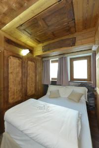 Postel nebo postele na pokoji v ubytování Mollino Rooms