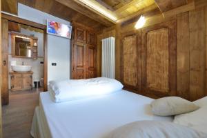 Postel nebo postele na pokoji v ubytování Mollino Rooms