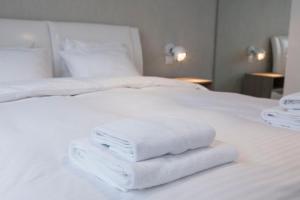 Posteľ alebo postele v izbe v ubytovaní Apartament Moniuszki by Your Freedom