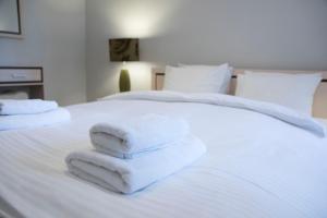 Posteľ alebo postele v izbe v ubytovaní Apartament Moniuszki by Your Freedom