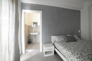 Postel nebo postele na pokoji v ubytování SaMi B&B