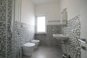 Koupelna v ubytování SaMi B&B + 3 fotografie