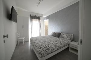 Postel nebo postele na pokoji v ubytování SaMi B&B