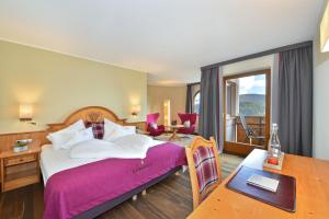 Ένα ή περισσότερα κρεβάτια σε δωμάτιο στο Hotel Lärchenhof +41 φωτογραφίες