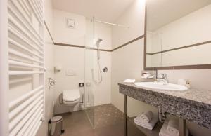 Ein Badezimmer in der Unterkunft Hotel Alpenwelt Superior