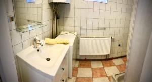 Koupelna v ubytování Napostó Pihenőház - Sunnylake Suites