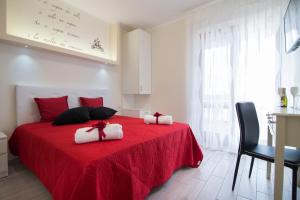 Posteľ alebo postele v izbe v ubytovaní Palazzo San Francesco