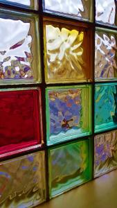 a group of colorful glass blocks with water at Gabrielles in Blackpool