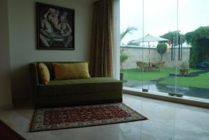 A seating area at The Lalit Temple View