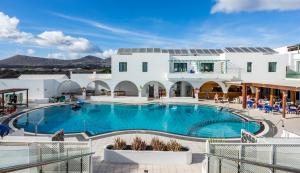 a view of the pool at a resort at Blue Sea Hotel Los Fiscos in Puerto del Carmen