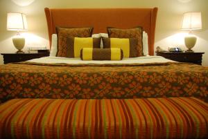A bed or beds in a room at The Lalit Temple View