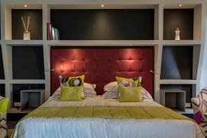 Postel nebo postele na pokoji v ubytování Hotel Hermitage