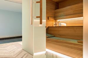 Postel nebo postele na pokoji v ubytování Hotel Cappuccino - Palma