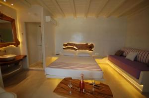 Posteľ alebo postele v izbe v ubytovaní Eternal Suites