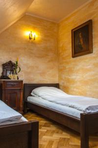 Cama o camas de una habitación en Dwór Anna