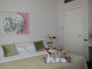 Posteľ alebo postele v izbe v ubytovaní Starhotels Cristallo Palace