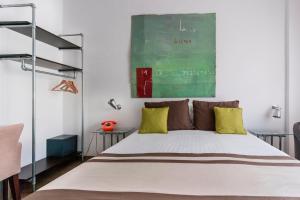Postel nebo postele na pokoji v ubytování Hotel Umu
