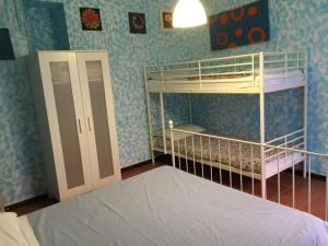 a bedroom with two bunk beds in a room at B&B Ca' da Lina in Deiva Marina