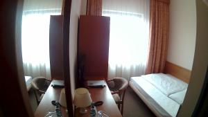 Postel nebo postele na pokoji v ubytování Hotel Christinenhof garni - Bed & Breakfast