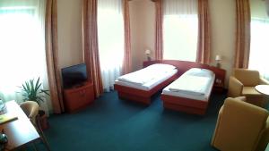 Postel nebo postele na pokoji v ubytování Hotel Christinenhof garni - Bed & Breakfast