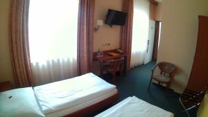 Postel nebo postele na pokoji v ubytování Hotel Christinenhof garni - Bed & Breakfast