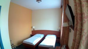 Postel nebo postele na pokoji v ubytování Hotel Christinenhof garni - Bed & Breakfast