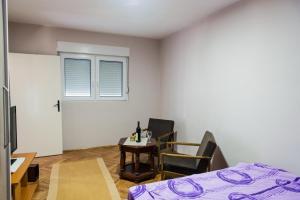 Ένα ή περισσότερα κρεβάτια σε δωμάτιο στο Apartman “Reka Gradac”