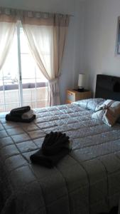 Posteľ alebo postele v izbe v ubytovaní Nerja Burriana Playa