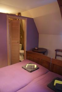 Postel nebo postele na pokoji v ubytování B&B De Metstermolen
